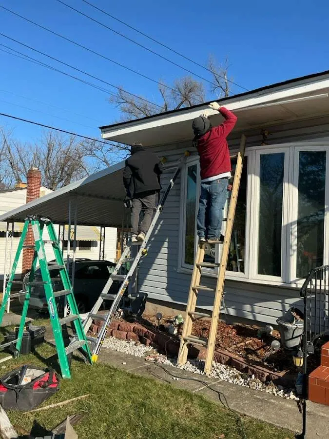 Restoration crew performing exterior repair in Middletown